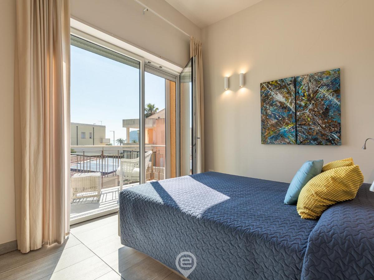 Poetto Sea Breeze - Blue Apartment Cagliari Bagian luar foto